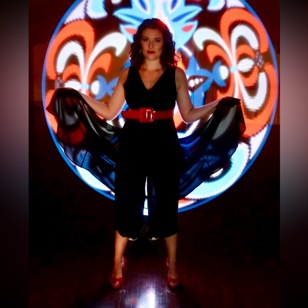Black v neck jumpsuit with skirt